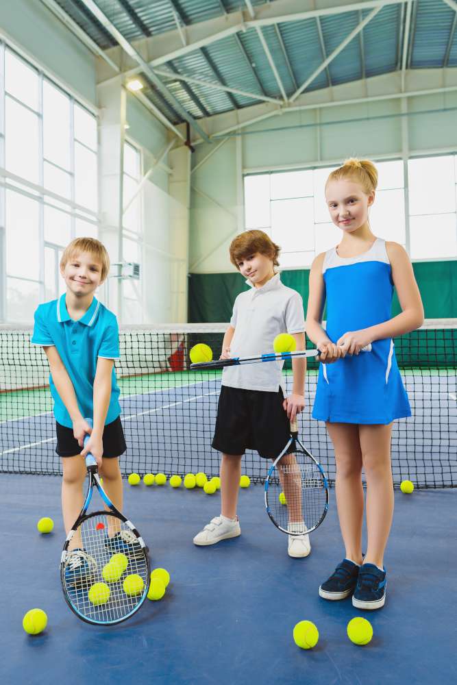 Junior tennis players indoors